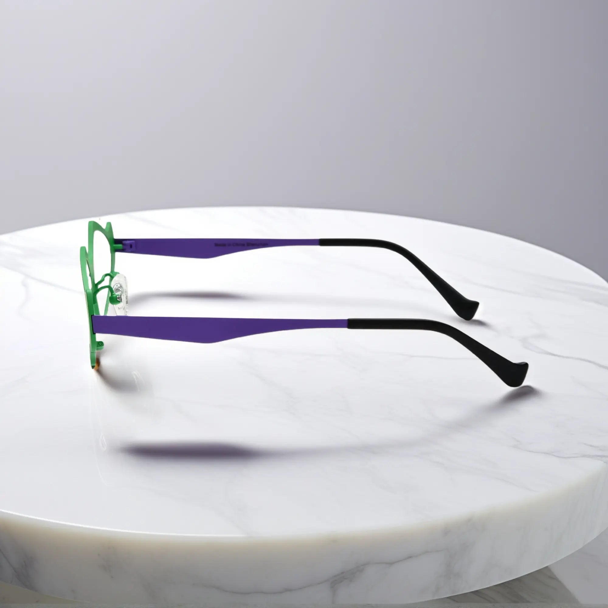 Side profile of VoyueLens™ VL185811 Violet Green titanium geometric eyeglasses showing temples
